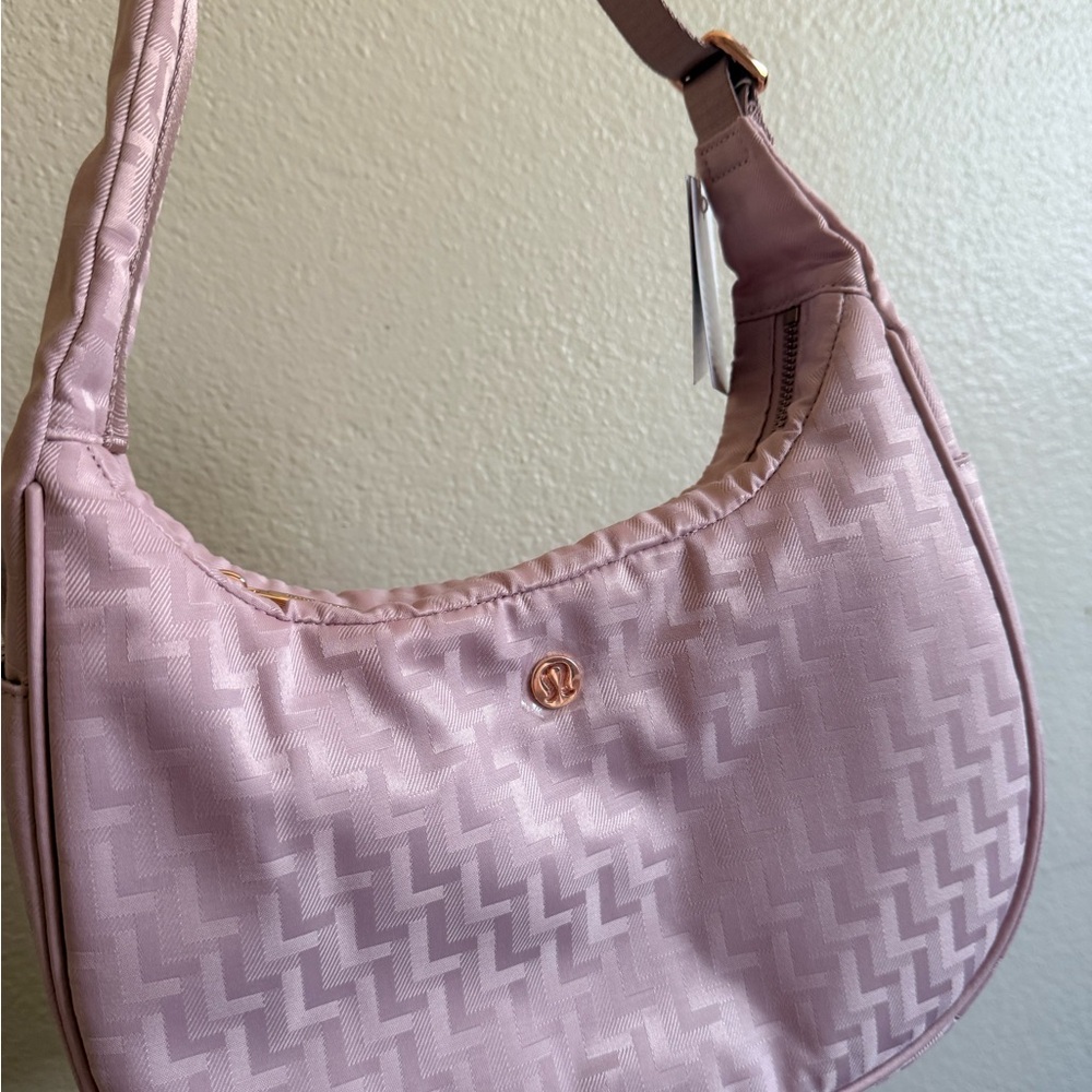 Pink Lululemon city essentials shoulder bag 
NWT
